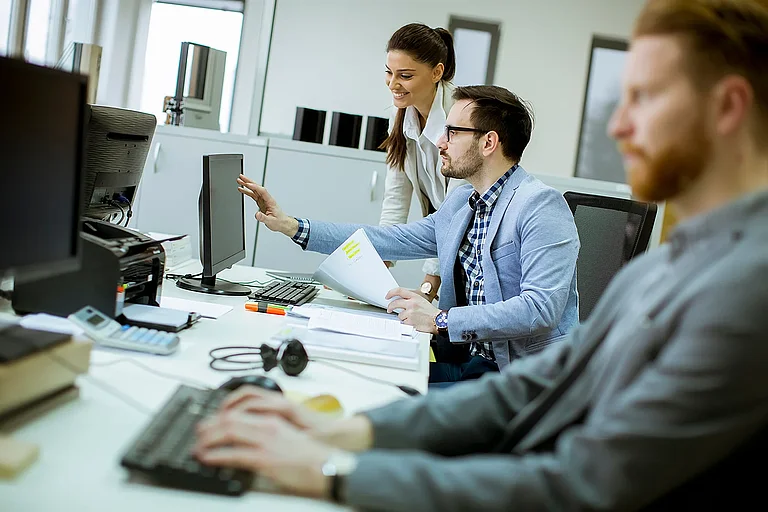 Group of young people working in the modern office