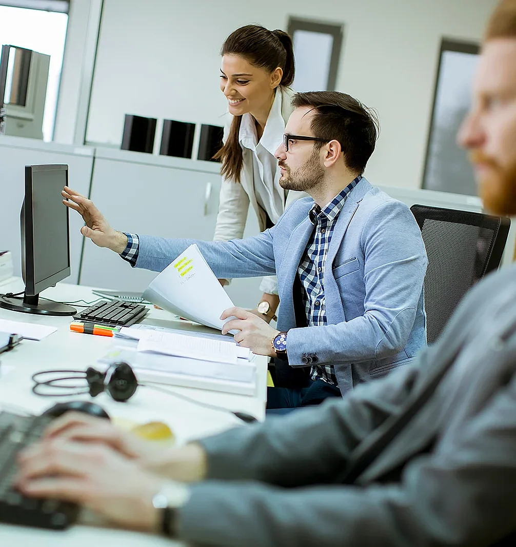 Group of young people working in the modern office